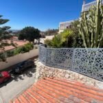 Vallados Málaga: cerramiento de seguridad perimetral troquelado a láser sobre entrada de garaje.